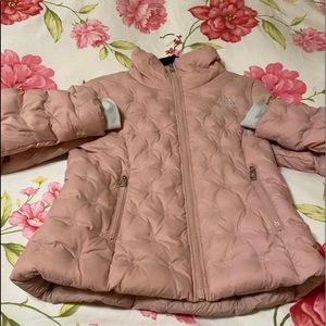 Light pink North Face down jacket
